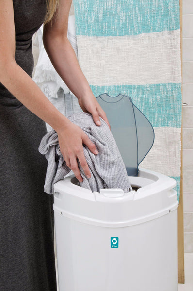 Loading the spin dryer. Laundry product 